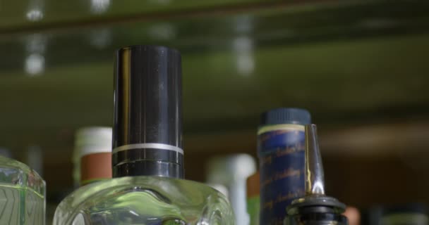 Lifting Replacing Liquor Alcohol Bottles Bar Shelves — Stock Video