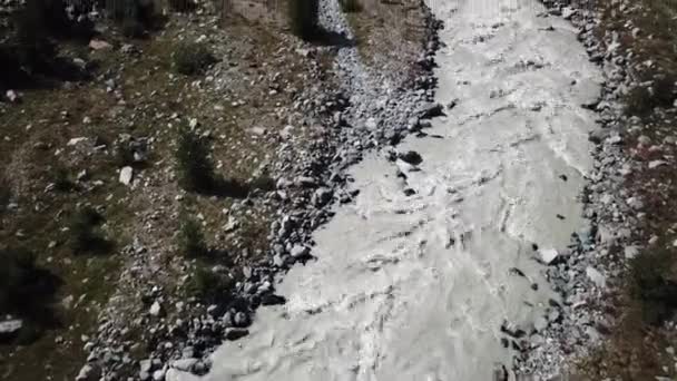 Drone View Tilt Rocky Muddy River Swiss Alps Strong Current — Stock Video