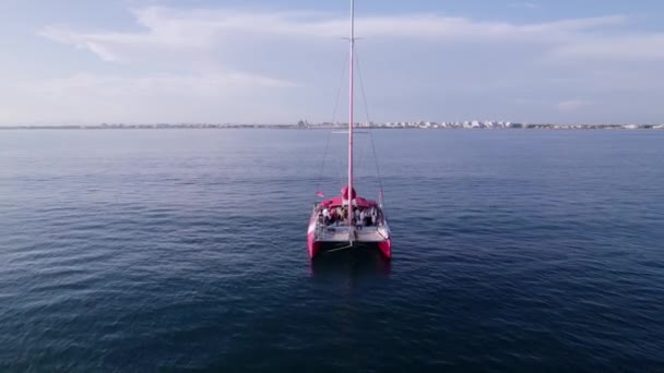 Aerial Zoom Out Shot Red Catamaran Mediterranean — Stock Video