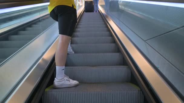People Going Escalator Airport Man Cell Phone — Stock Video