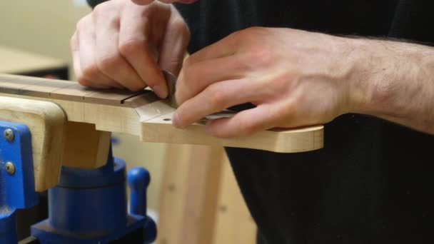 Hands Guitar Maker Workshop Doing Final Smoothing Fretboard Headstock Transition — Stock Video