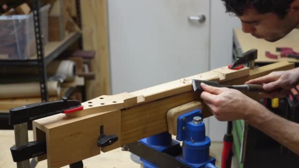 Guitar Maker Working Chisel Cutting Out Facets Back Guitar Neck — Stock Video