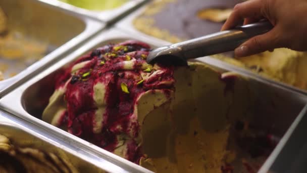 Manicured Hand Scooping Berry Pistachio Selection Artisan Gelato Trays — Stock Video
