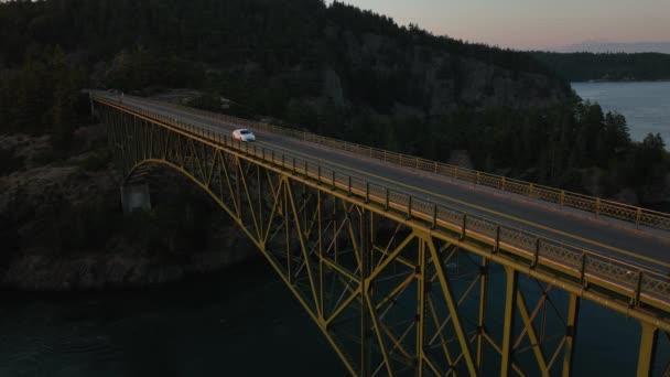 Static Aerial Shot White Sedan Driving Deception Pass Bridge Sunrise — Stock Video