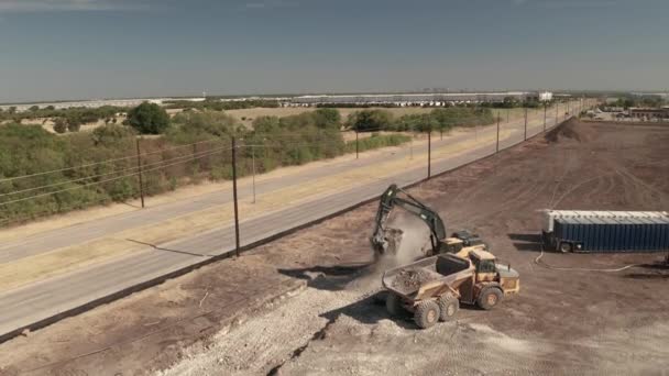 Dump Truck Gets Filled Dirt Rocks Crane Loader — Stock Video