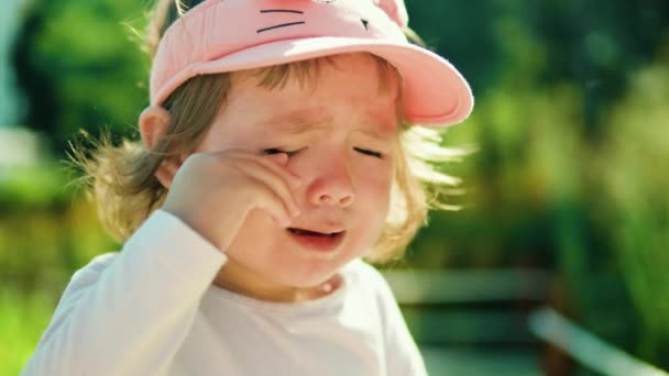 Child Cries Lot Rubbing Eyes Outdoors Selective Focus Face Close — Stock Video