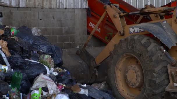 Bulldozer Loads Bucket Waste Further Dumping Conveyor Belt Waste Processing — Stock Video