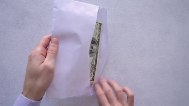Hands Taking Out Bundle One Hundred Dollar Bills Envelope Overhead — Stock Video