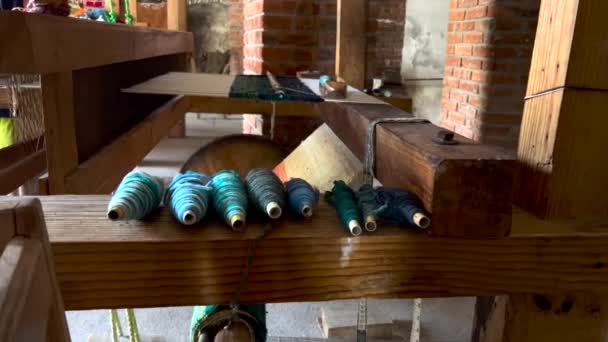 Colored Wool Threads Yarns Wooden Counter Rugs Workshop Artisan Fabric — Stock Video