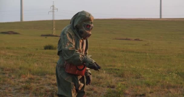 Person Wearing Protective Suit Gas Mask Measures Collects Data Contaminated — Stock Video