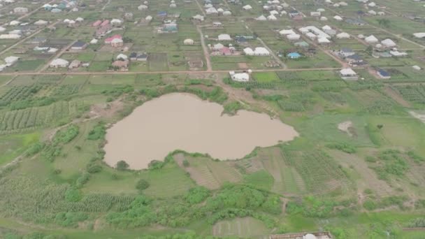 Aerial Lacul Brun Orașul Din Platoul Jos Nigeria Înainte Înclinat — Videoclip de stoc