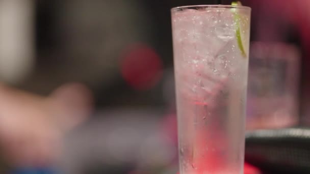 Close Bartender Placing Straw Drink Lime Ice Slow Motion — Stock Video