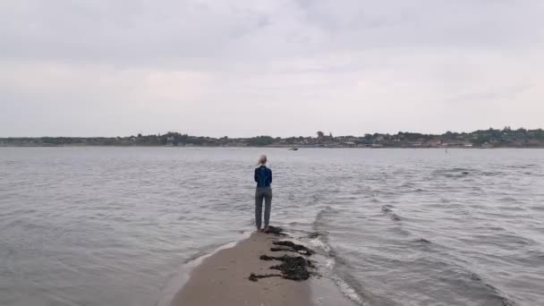 Back View Woman Standing End Sandbar Enjoying View Danish Fjord — Stock Video