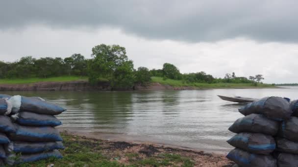 Local Fishermen Canoe Outboard Motor Speeds River — Stock Video