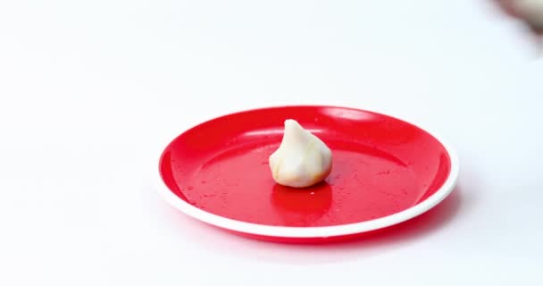 Static Shot Sweet Modak Being Placed Red Plate Ganesha Chathurthi — Stock Video