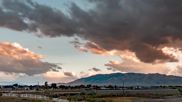 Colorful Dynamic Sunset Mountain Storm Clouds Gather Time Lapse — Stock Video