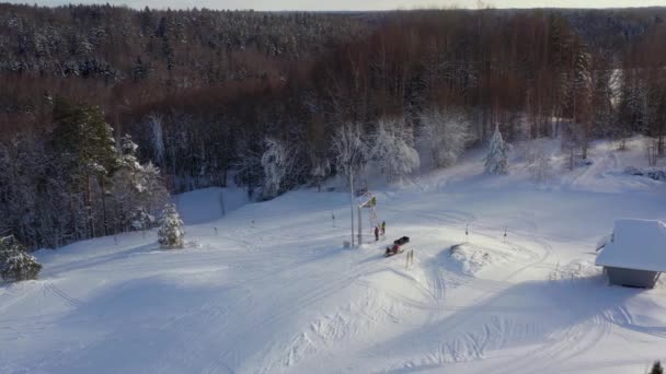 Drone Shot Panning Right Showing How People Get Ski Machine — Stock Video