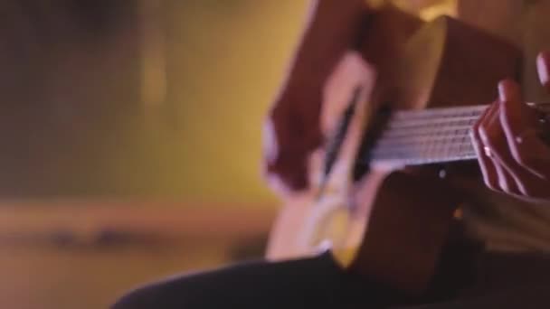 Man Playing Acoustic Guitar Focused Head — Stock Video