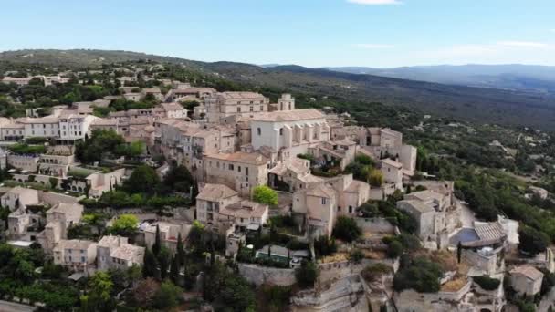 Drone Vole Autour Gordes Révélant Vallée Ouverte Derrière Village — Video