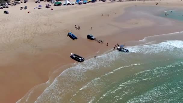 Smooth High Angle Aerial View People Loading Boat Out Waves — Stock Video