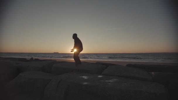 Male Dancer Dances Lyrically Wide Angle Front Ocean — Stock Video