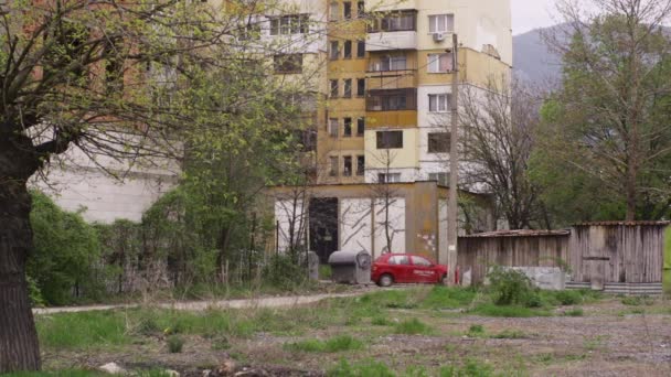 Old Brutalist Apartment Building Wooden Shacks Post Communist Bulgaria Eastern — Stock Video