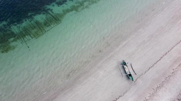 Aerial Traditional Fishing Boat Moored White Sandy Shoreline Beach Crystal — Stock Video