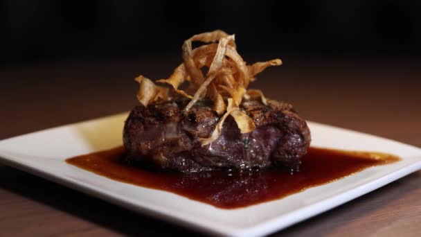 Beef Tournedos Rossini Topped Haystack Onions Demi Glace Sauce Close — Stock Video
