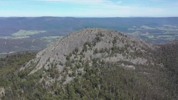 Craggy Barren Sugarloaf Peak Rises Starkly Surrounding Valley — Stock Video