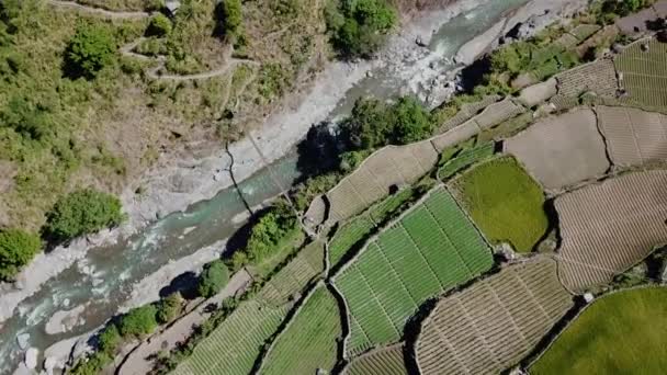 Metal Suspension Bridge Connecting Mountainous Zig Zag Dirt Gravel Trail — Stock Video
