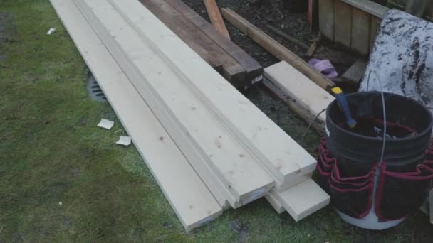 Lumber Stacked Grass Backyard Diy Hime Improvement Construction Project Deck — Stock Video