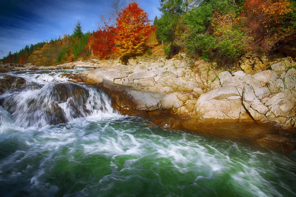 Mountain fast flowing river stream of water in the rocks at autu — Stock Photo, Image