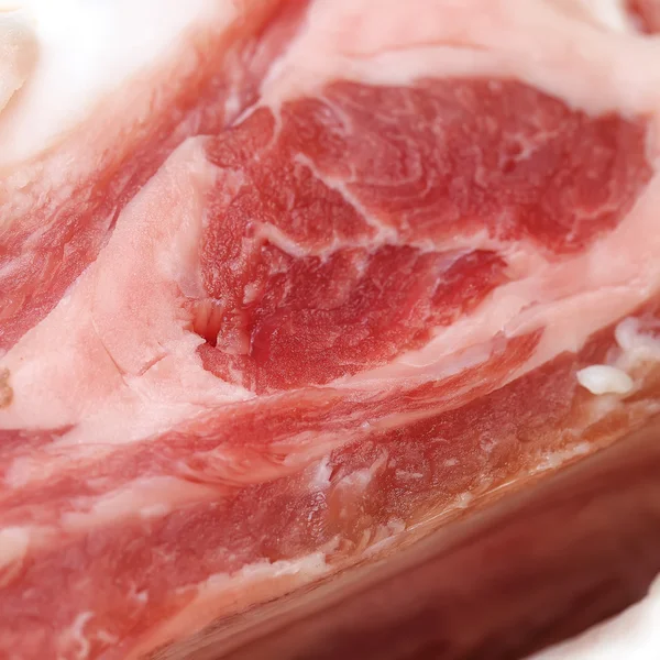 Geschnittenes Schweinefleisch mit Speck aus nächster Nähe — Stockfoto