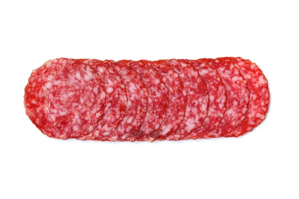 Salami in Scheiben geschnitten auf einem weißen — Stockfoto