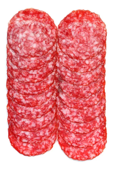 Salami in Scheiben geschnitten auf einem weißen. — Stockfoto