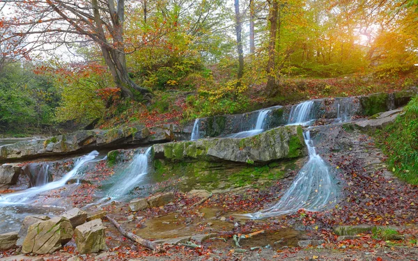 Mountain stream in autumn at sunset — Stock Photo, Image