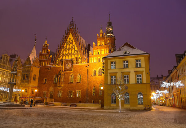 Night lights of the city on Christmas night in Wroclaw. Central square