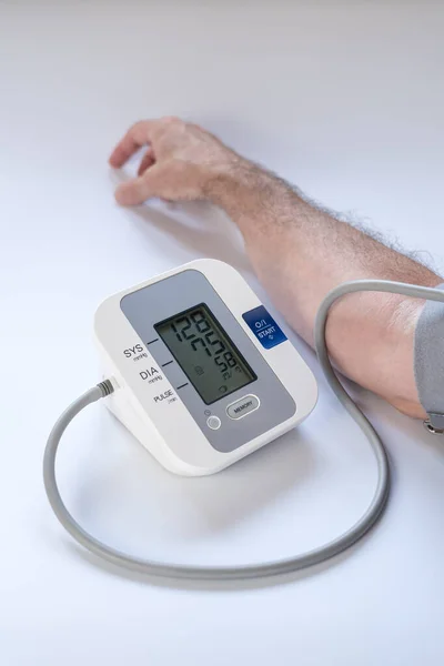 Man Taking Blood Pressure Result High Blood Pressure Royalty Free Stock Photos