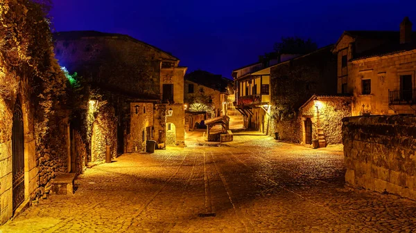 Panoramic view of the stone village with stone houses at dusk. Santander, Santillana del Mar.