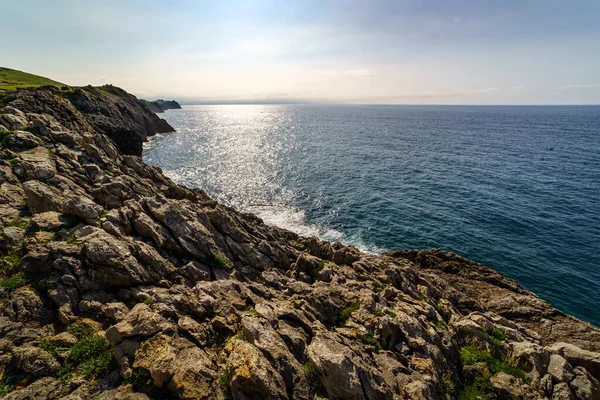 Puesta Sol Horizonte Marino Con Acantilados Piedra Santander —  Fotos de Stock