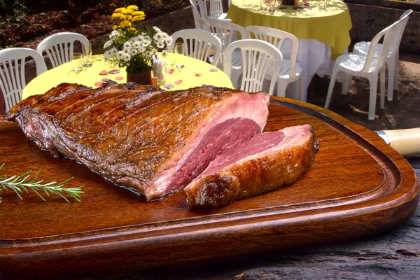 Roast picanha on wooden board — Stock Photo, Image