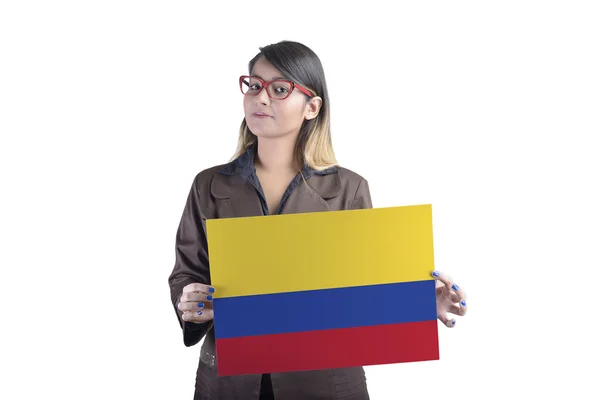 Ділова жінка тримає прапор Колумбії — стокове фото