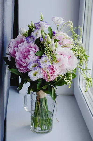 Beautiful bouquet of pink peonies, roses, eustoma flowers in vase on ...