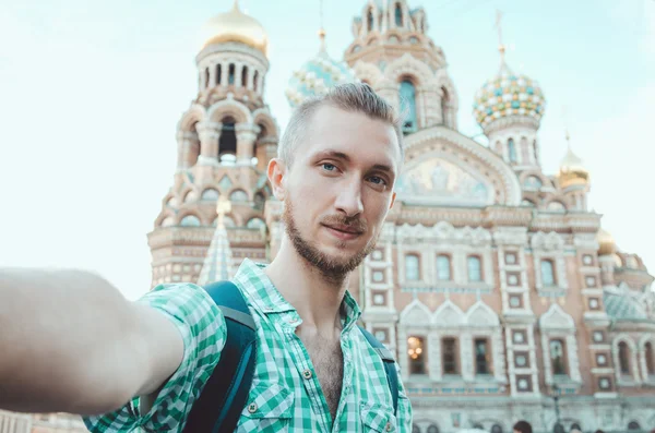 SAINT-PETERSBURG, RUSSIA: Happy tourist man. Concept selfie self portrait.