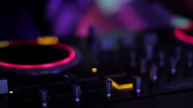 Hands of DJ which mixes music tracks CD mixer in nightclub 8