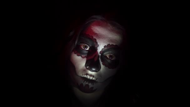 Portrait of creepy woman with a make-up for Halloween in santa muerte style — Stock Video