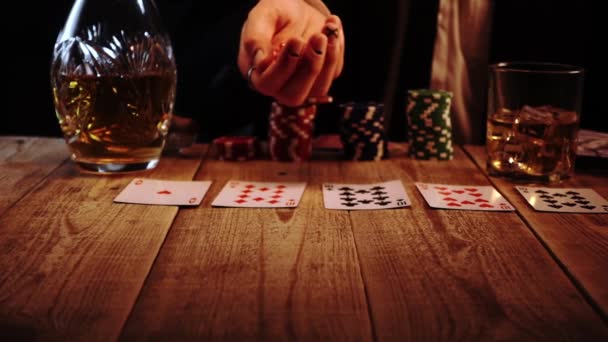 Closeup view of man throwing two dices during casino game sitting in a bar in slow motion — Wideo stockowe