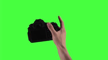 Set of 9 gestures of male hands holding photo camera and pushing button on green screen background