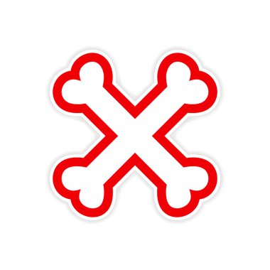 etiket beyaz bir arka plan üzerinde yığılmış kemikleri çapraz