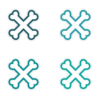 derleme etiket beyaz bir arka plan üzerinde yığılmış kemikleri çapraz